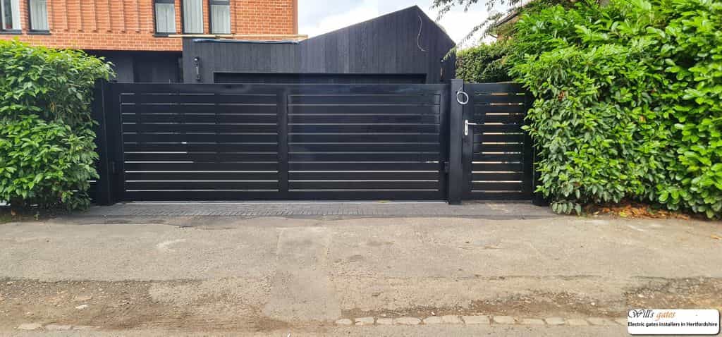 Bespoke aluminum sliding gate and pedestrian gate